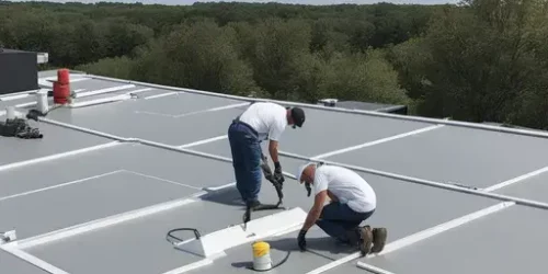commercial roofers working on flat roof